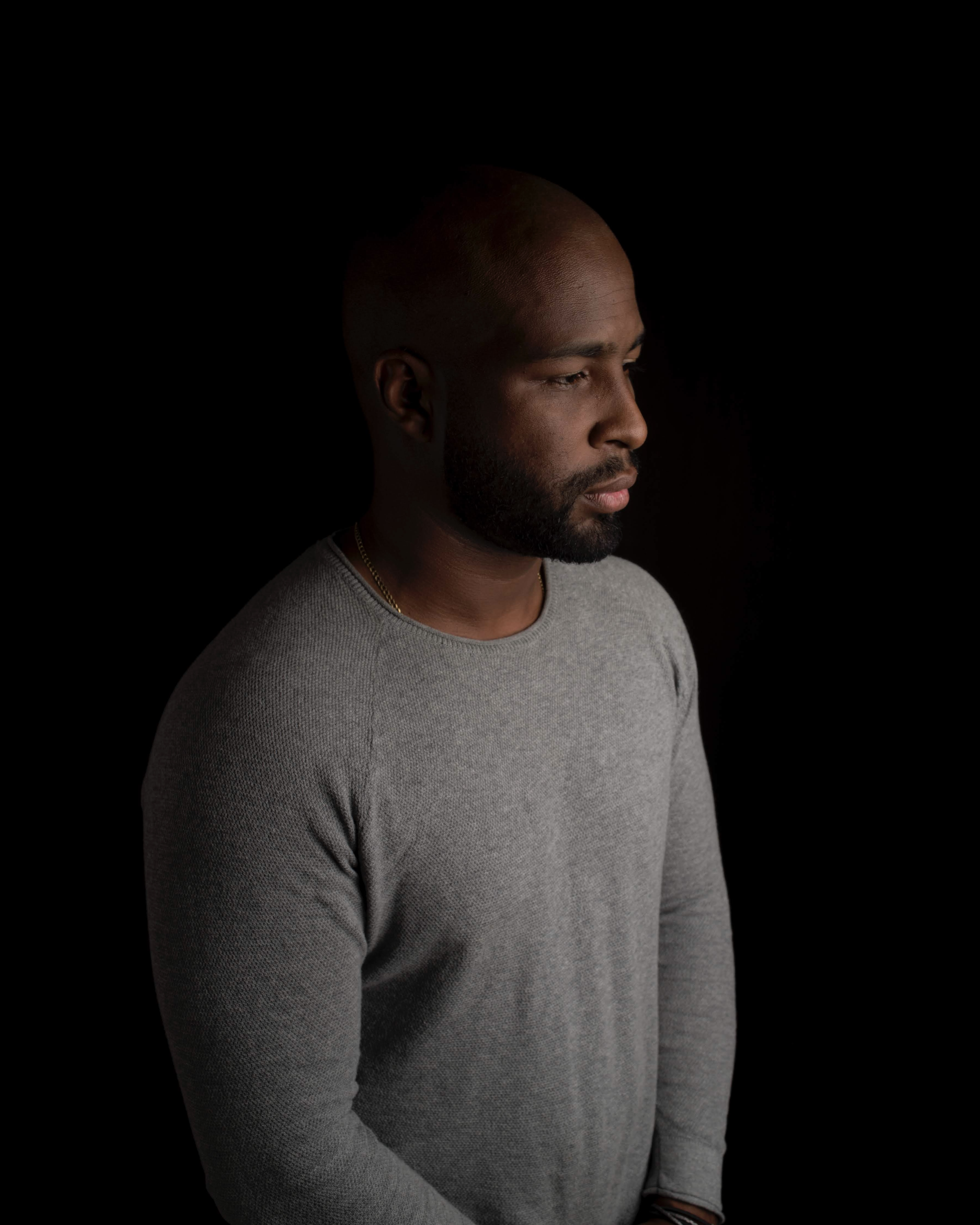 A photo of Mario Campbell, looking at the right